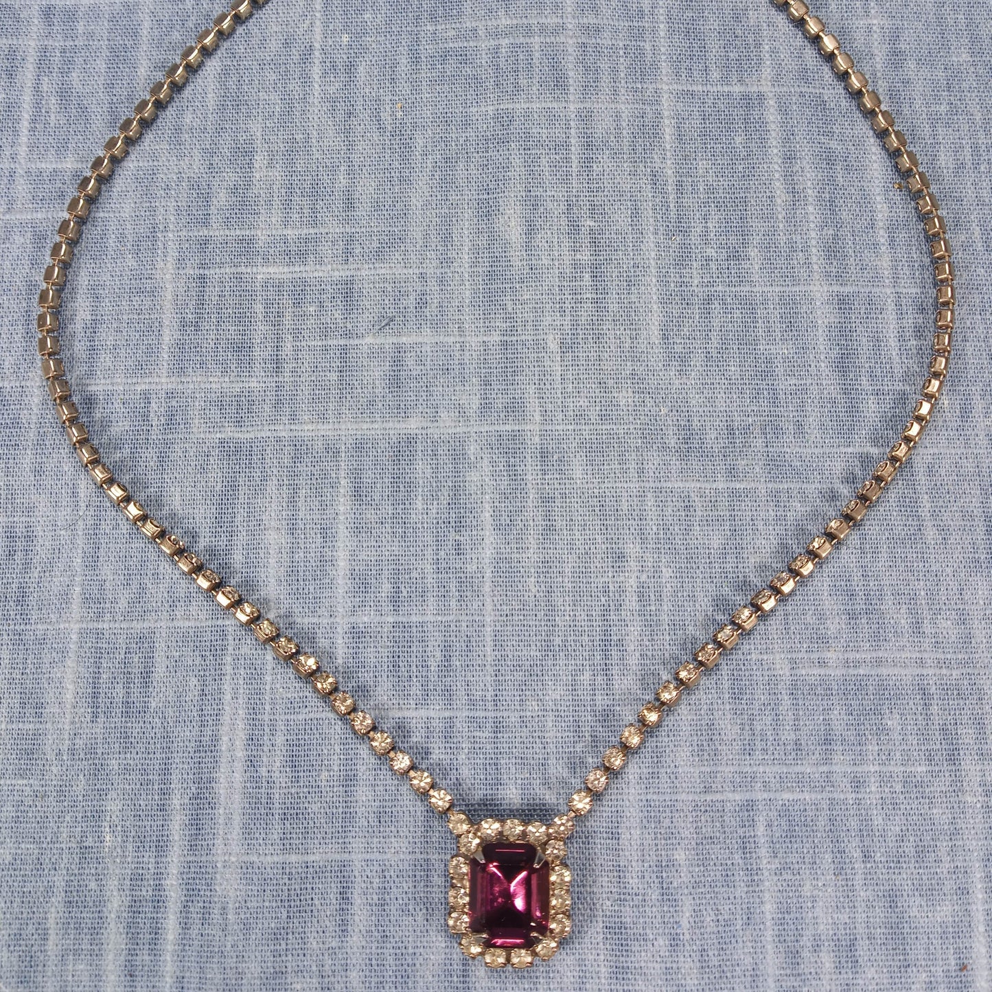 1980s Vintage Necklace with a Single Strand of Clear Rhinestones and Red Pendant