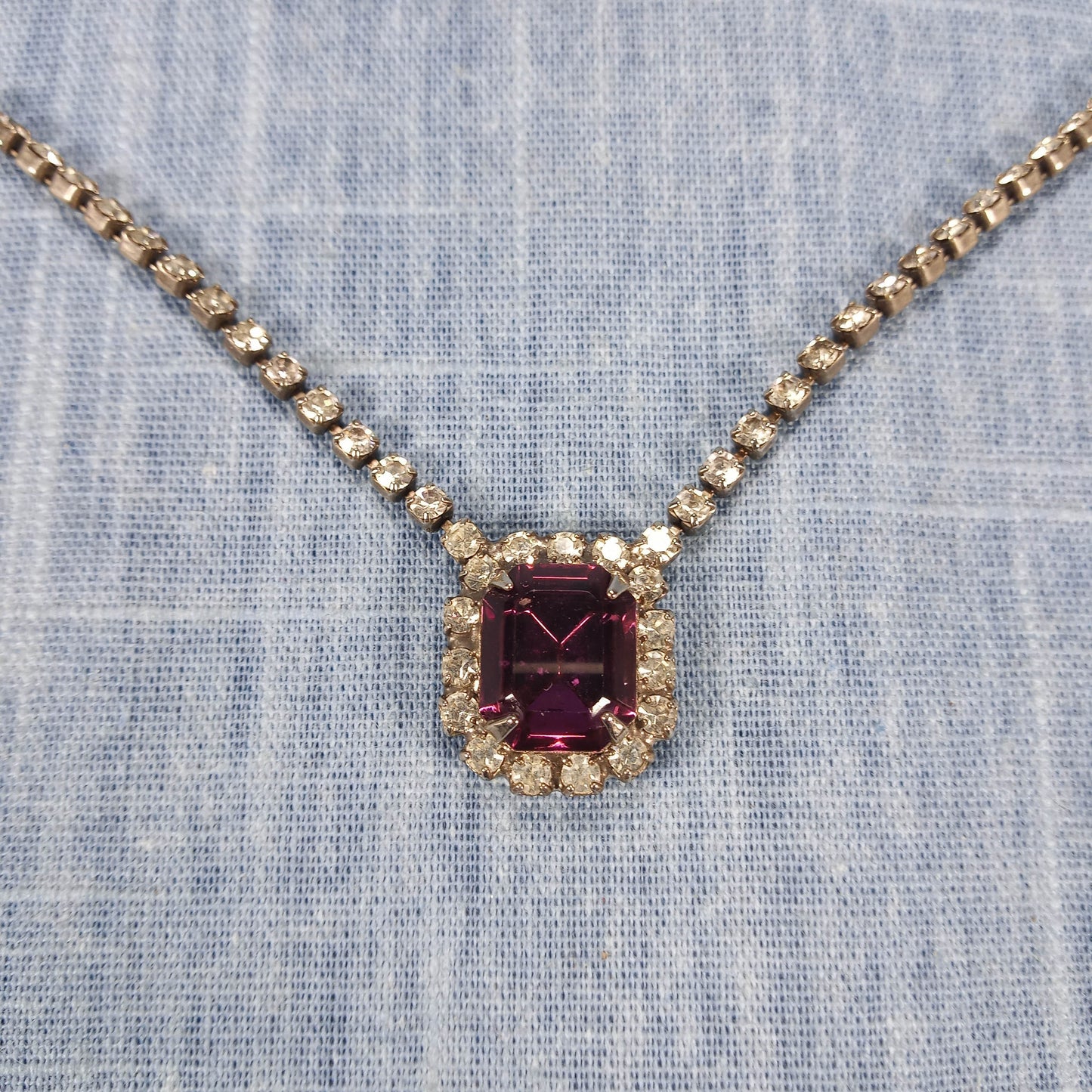 1980s Vintage Necklace with a Single Strand of Clear Rhinestones and Red Pendant