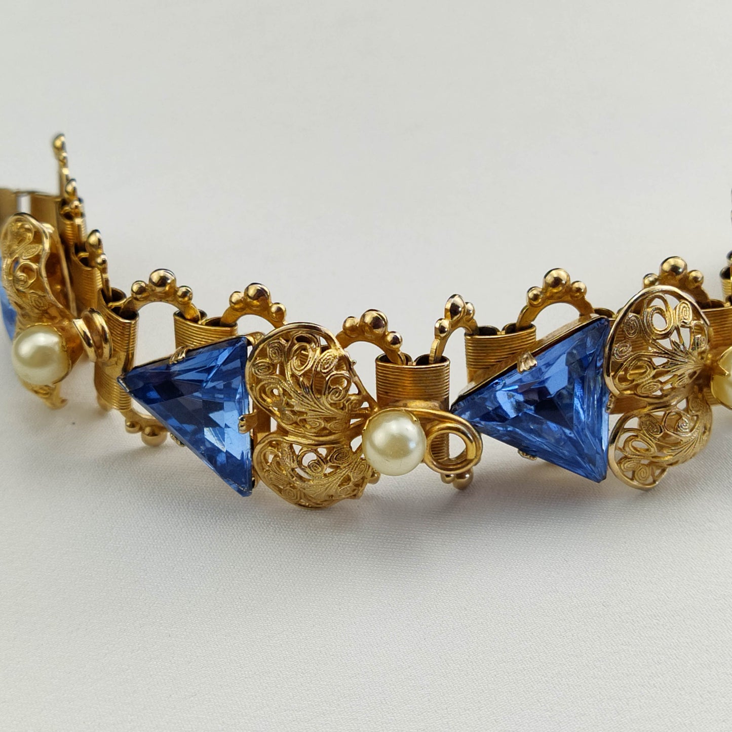 1950's Blue Trillion Cut Crystals and Faux Pearls in Gold Metal Tone