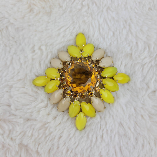 1950's Bronze and Yellow Rhinestone Pin with an Amber Glass Center Cut