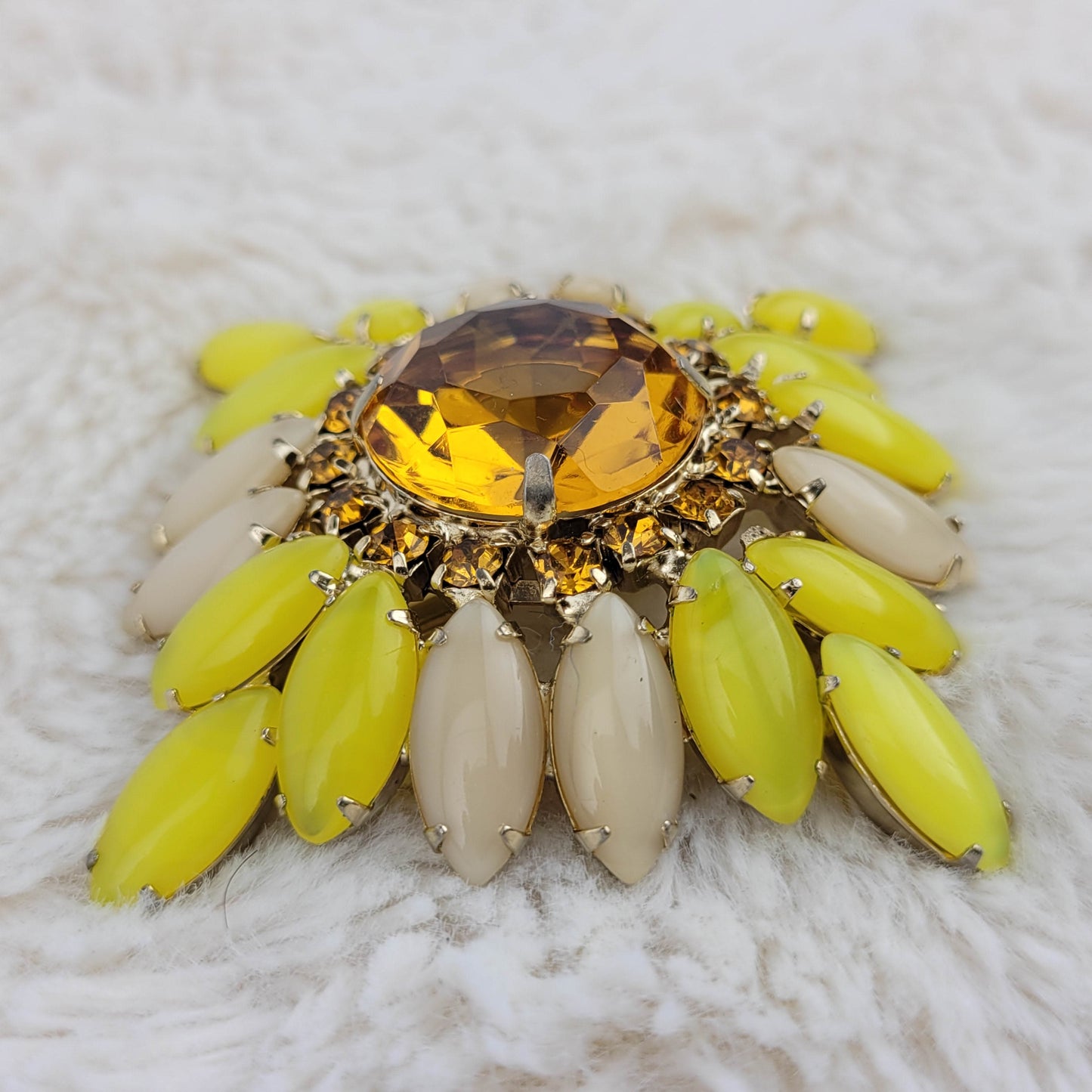 1950's Bronze and Yellow Rhinestone Pin with an Amber Glass Center Cut