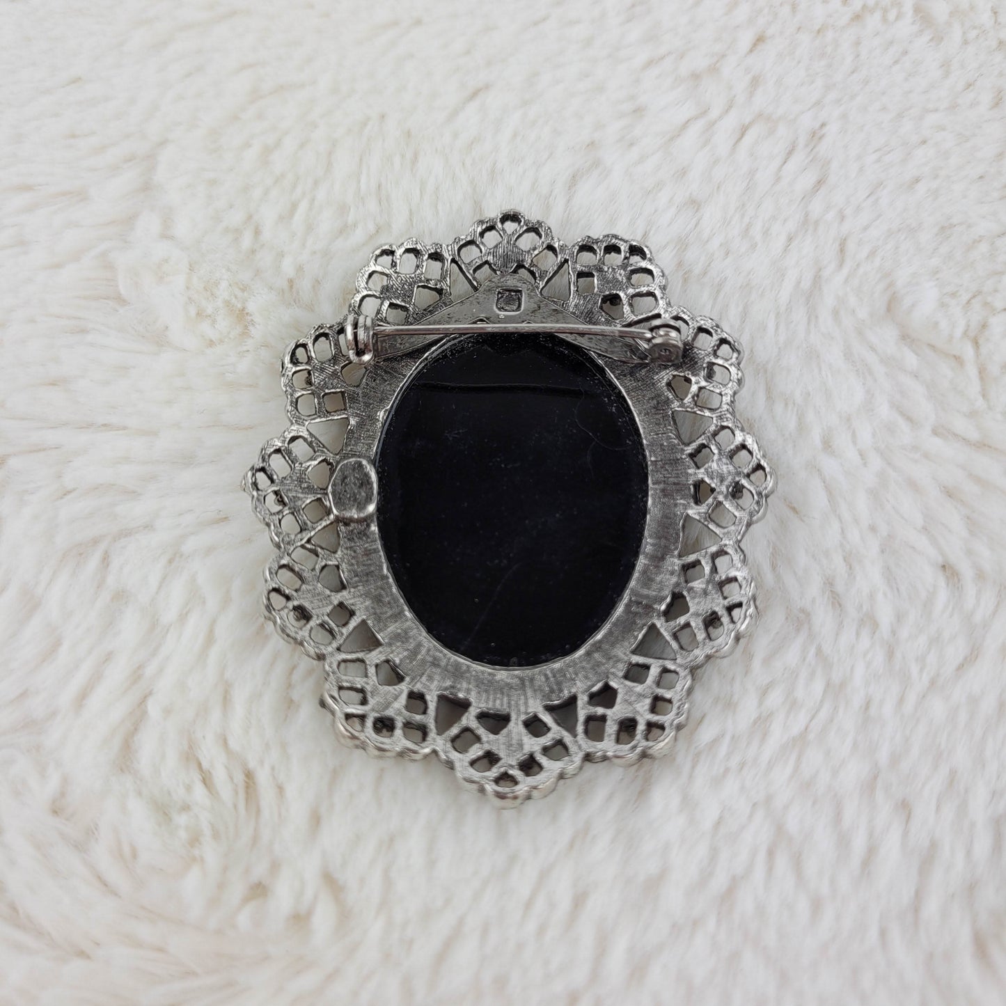 1960's Black and Silver Metal Cameo Pin Featuring Intertwined Roses