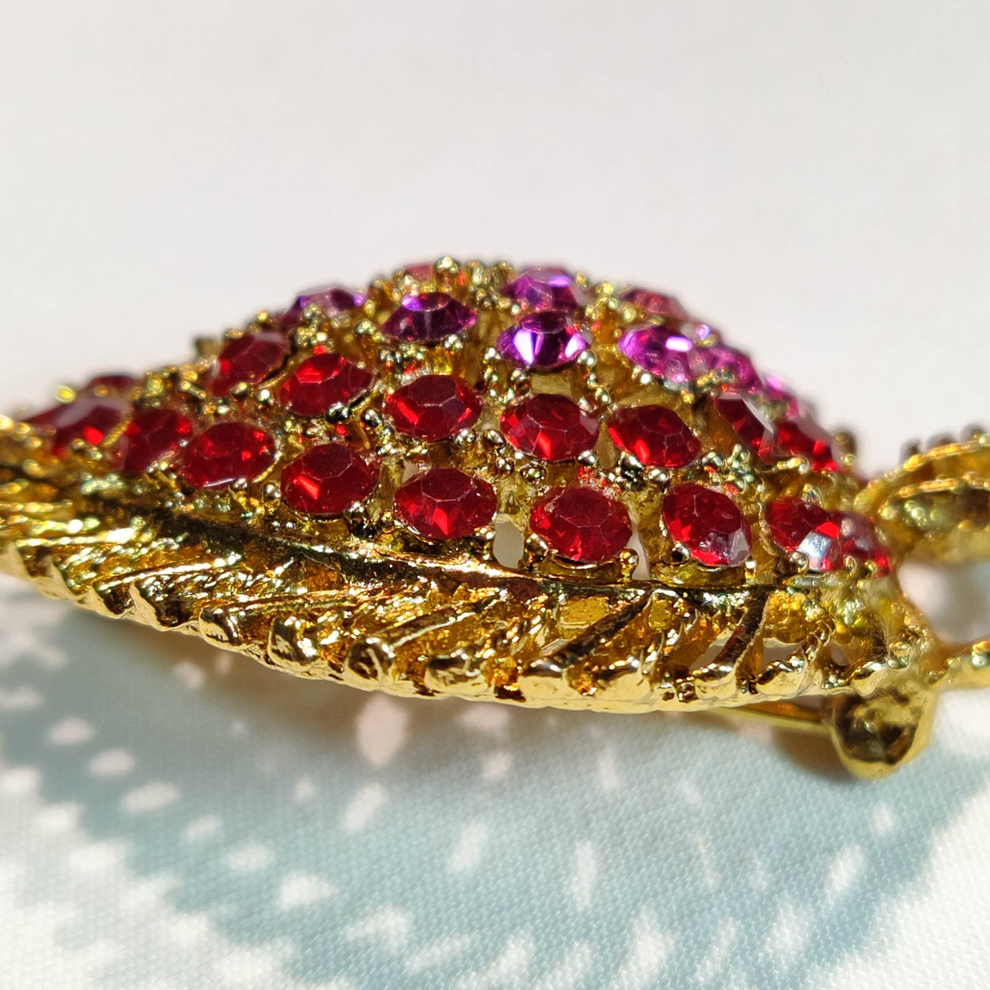 1960's Gold Metal Filigree with Red and Purple Rhinestones Leaf Pin