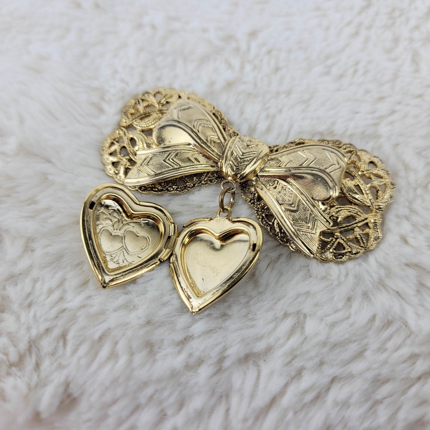 1950's Gold Tone Metal Filigree Bow with Heart Locket Pin