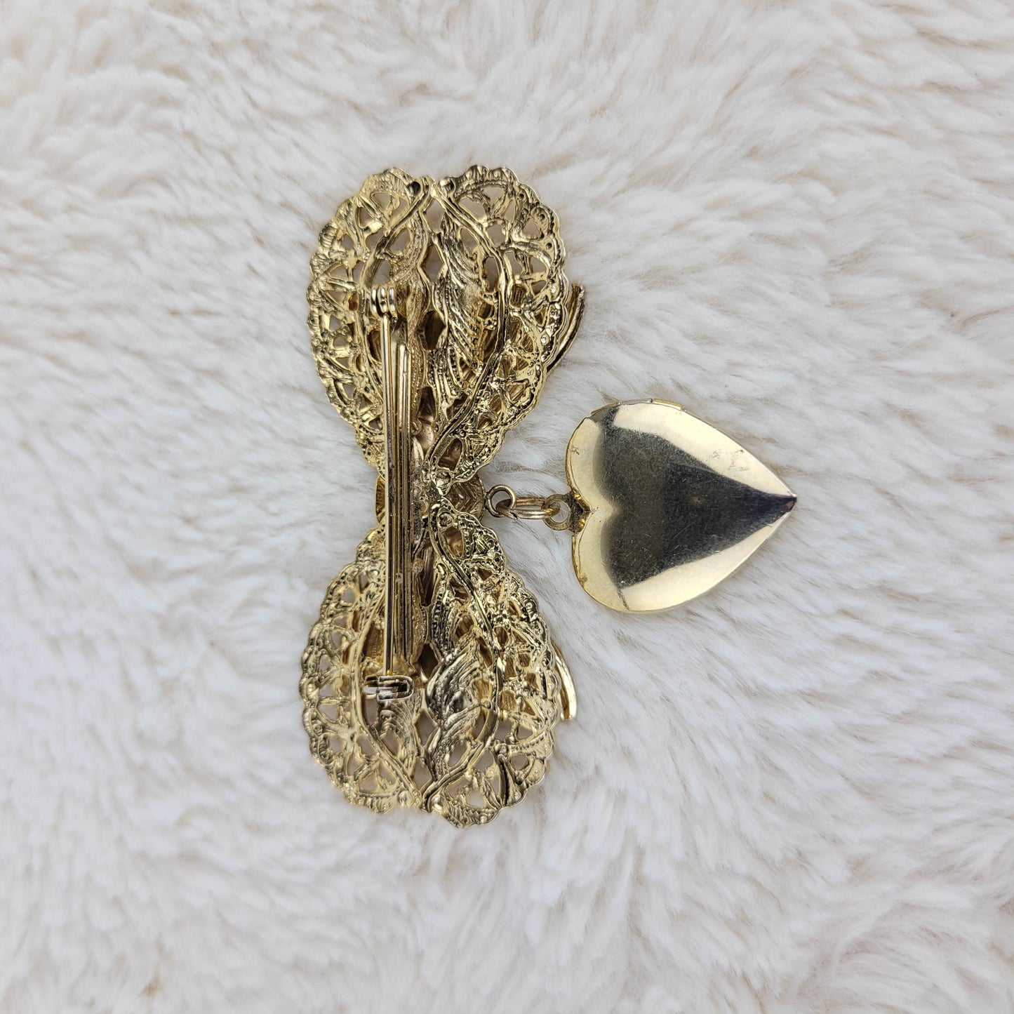 1950's Gold Tone Metal Filigree Bow with Heart Locket Pin