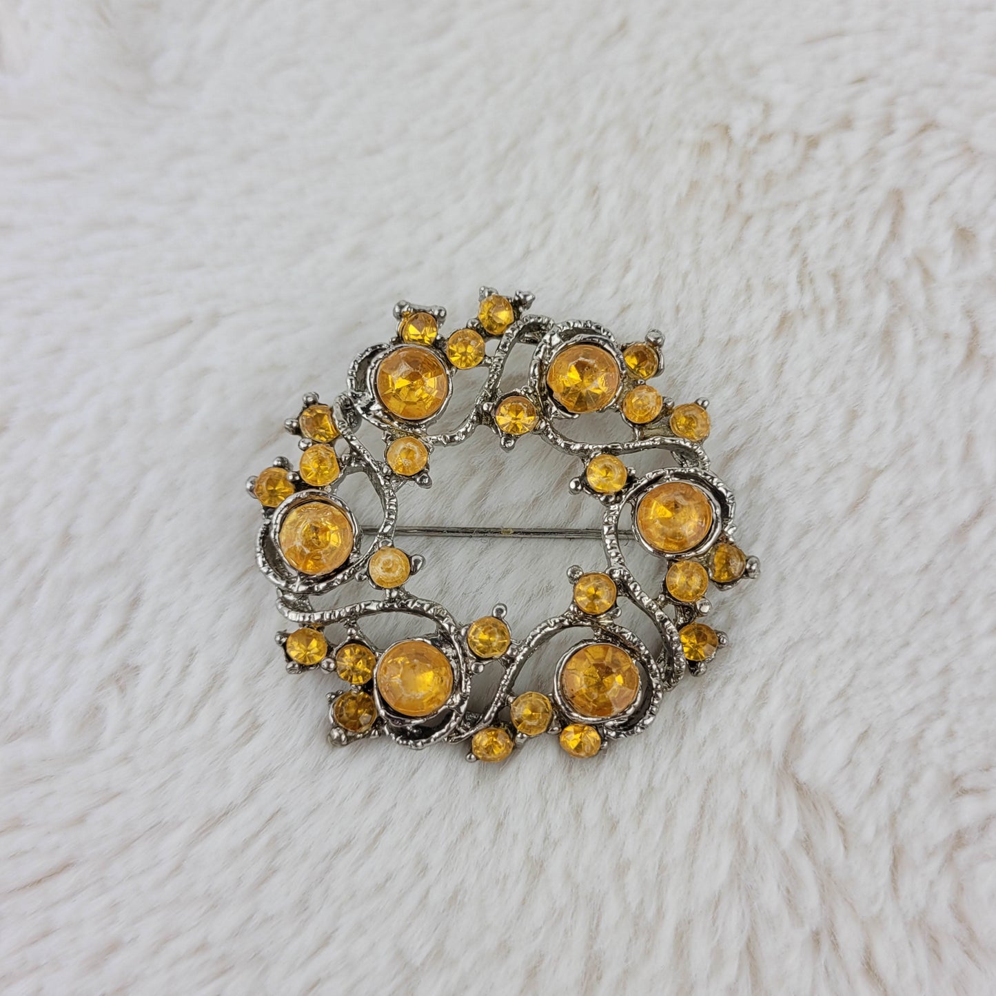 1970's Silver Metal and Yellow Rhinestone Circular Pin