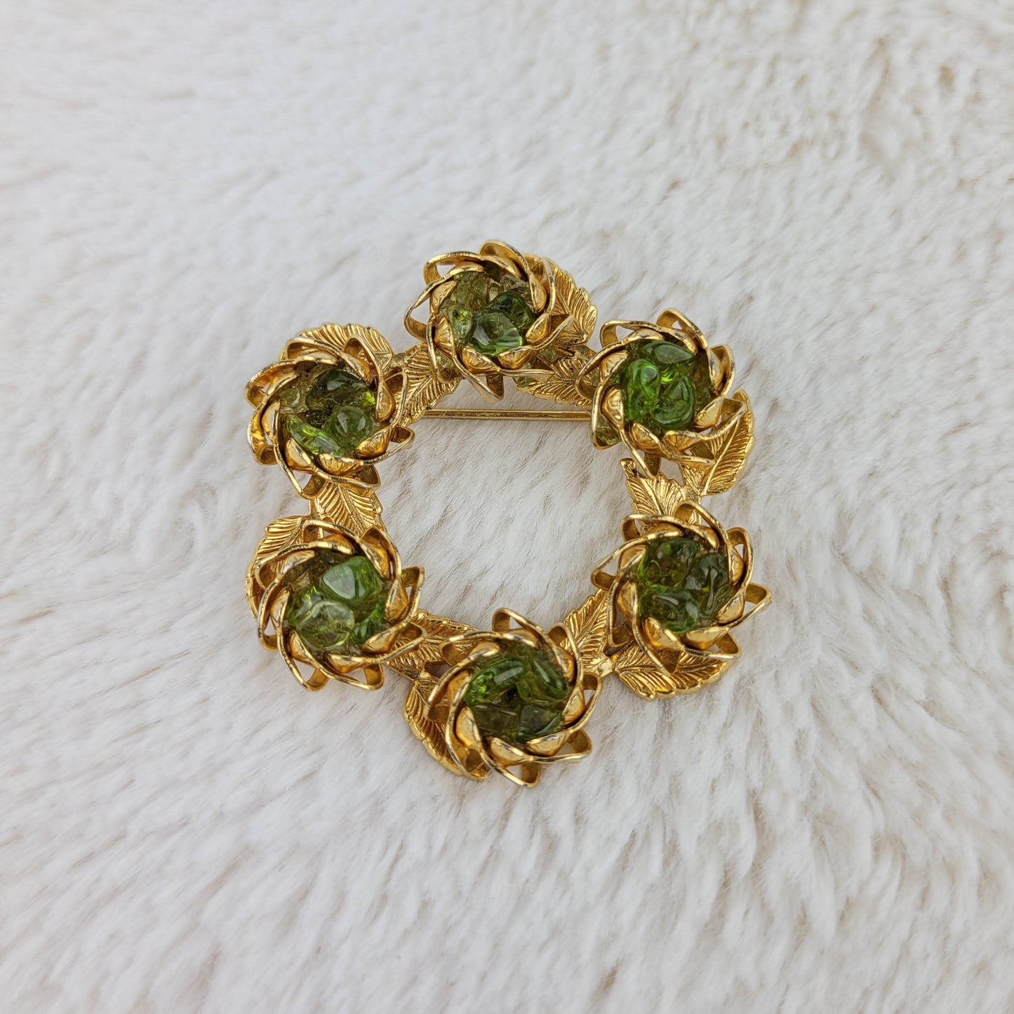 1960 Gold Metal Circular Rose Pin with Peridots