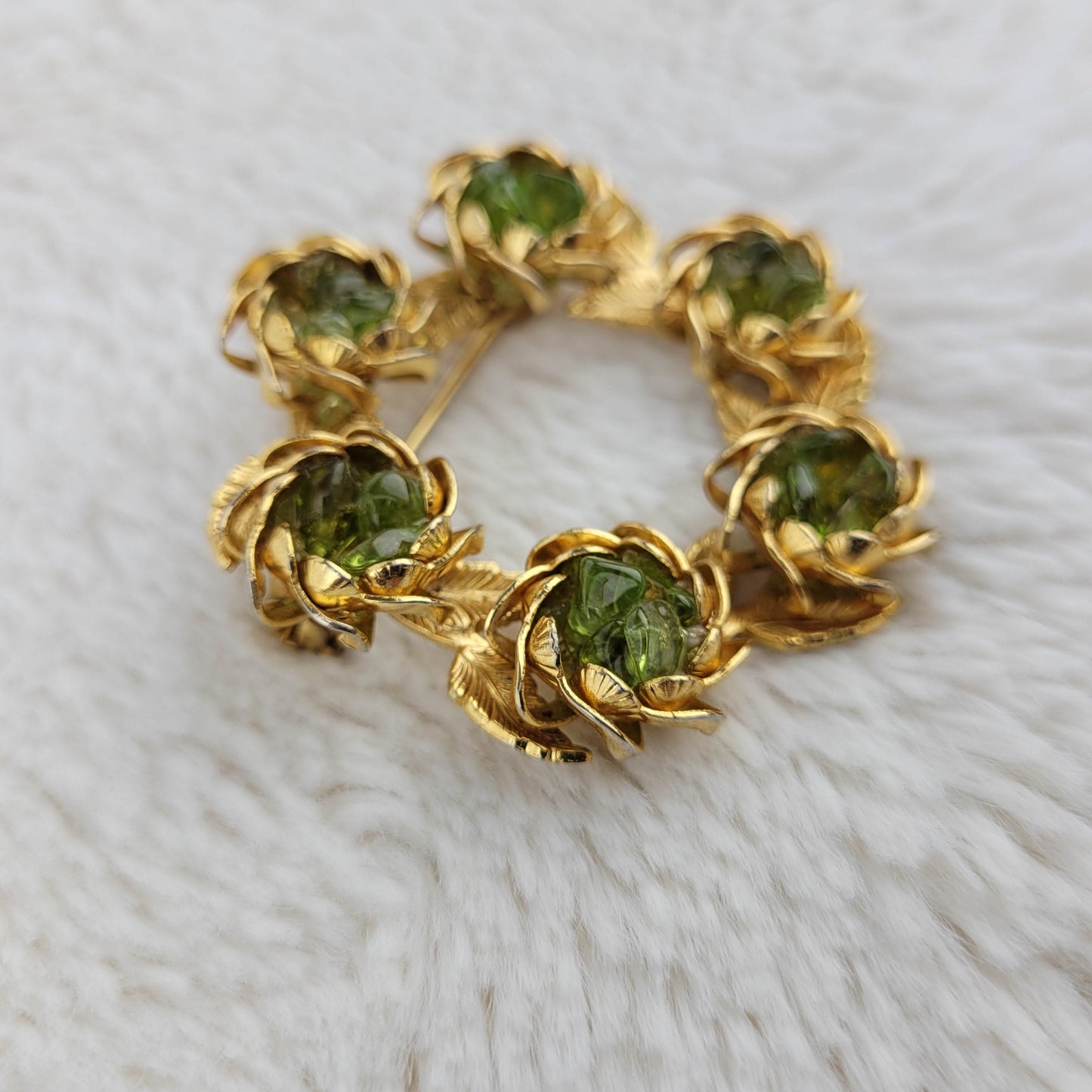 1960 Gold Metal Circular Rose Pin with Peridots