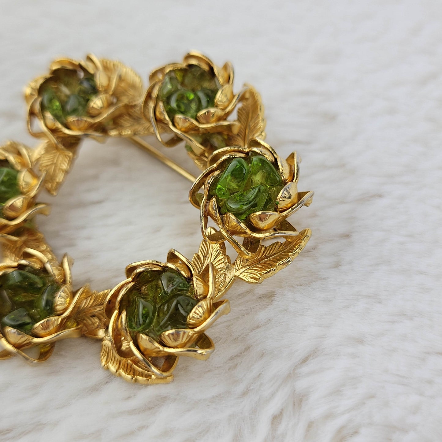 1960 Gold Metal Circular Rose Pin with Peridots