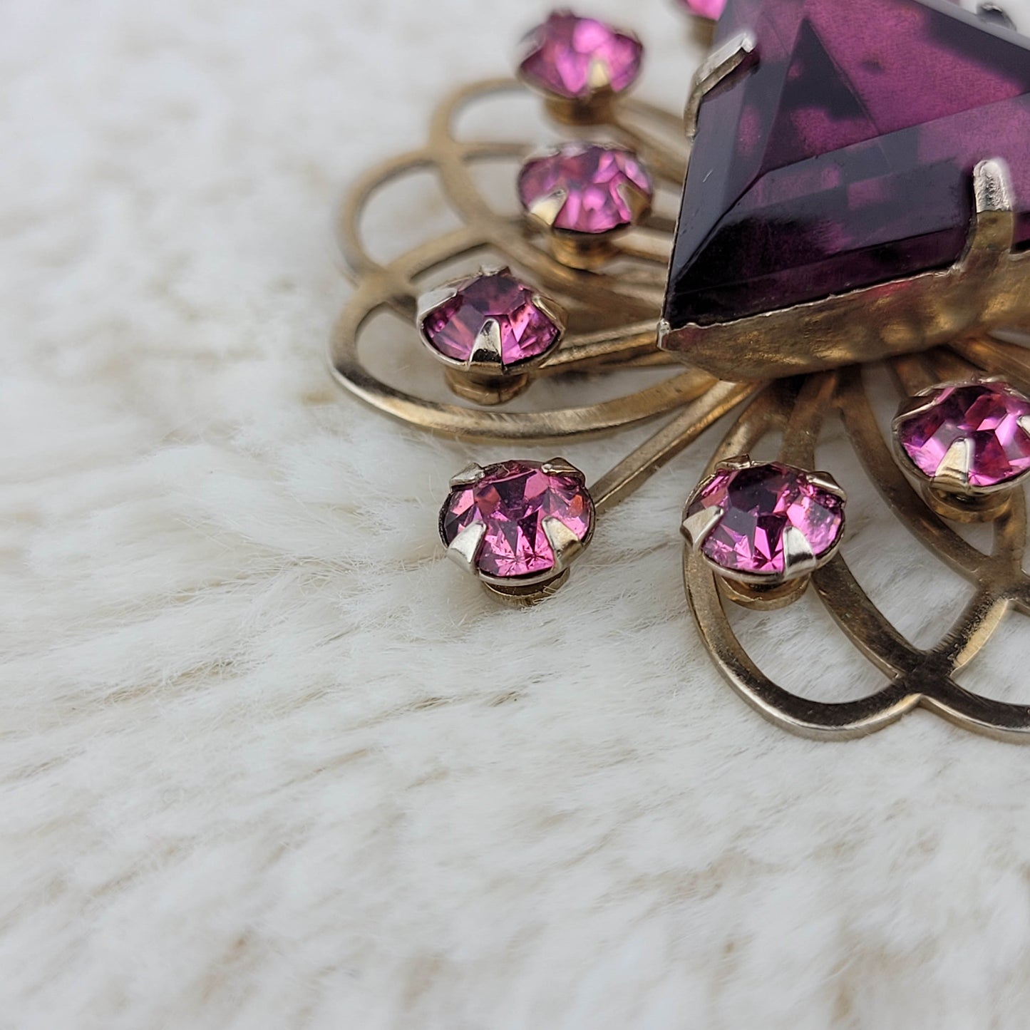 1950's Triangular Purple Rhinestone Swirling Gold Metal Tone Pin