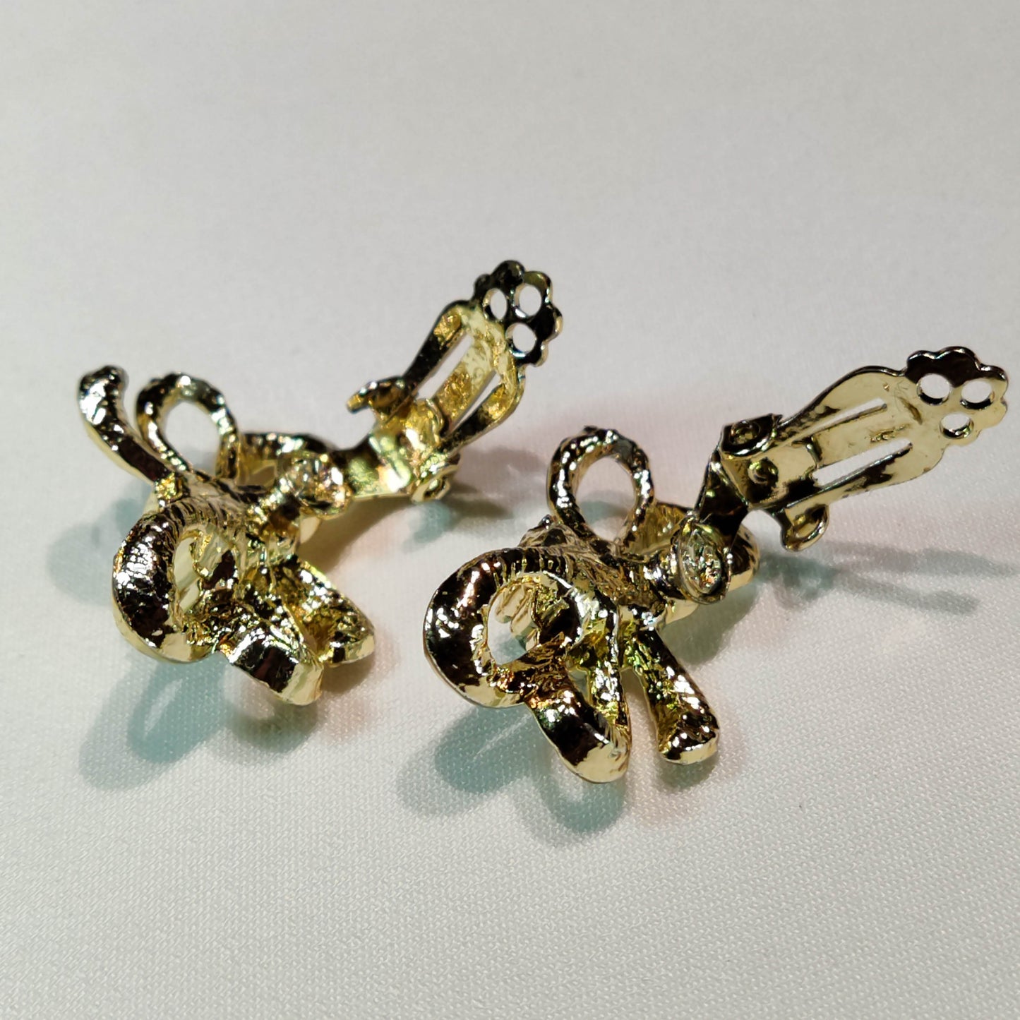 1960's Gold Tone Metal and Aurora Borealis Bow Tie Earrings