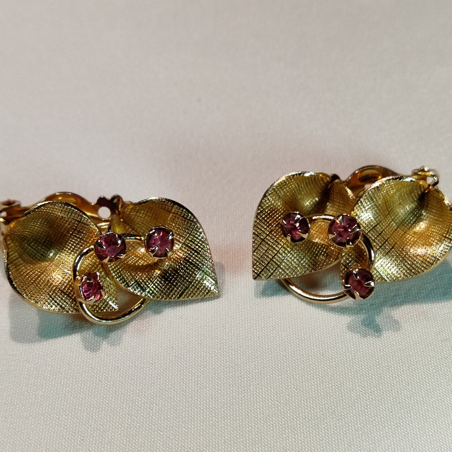 1960's Gold Metal Leaves and Plumb Rhinestone Clip Earrings