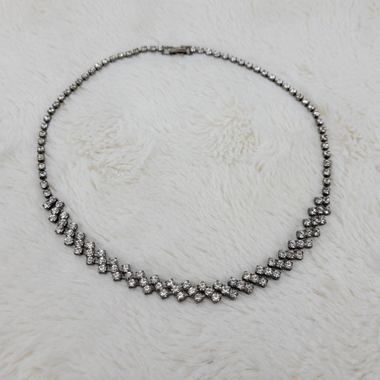 1950's Single to Triple Row Clear Rhinestone on a Dark Metal Necklace