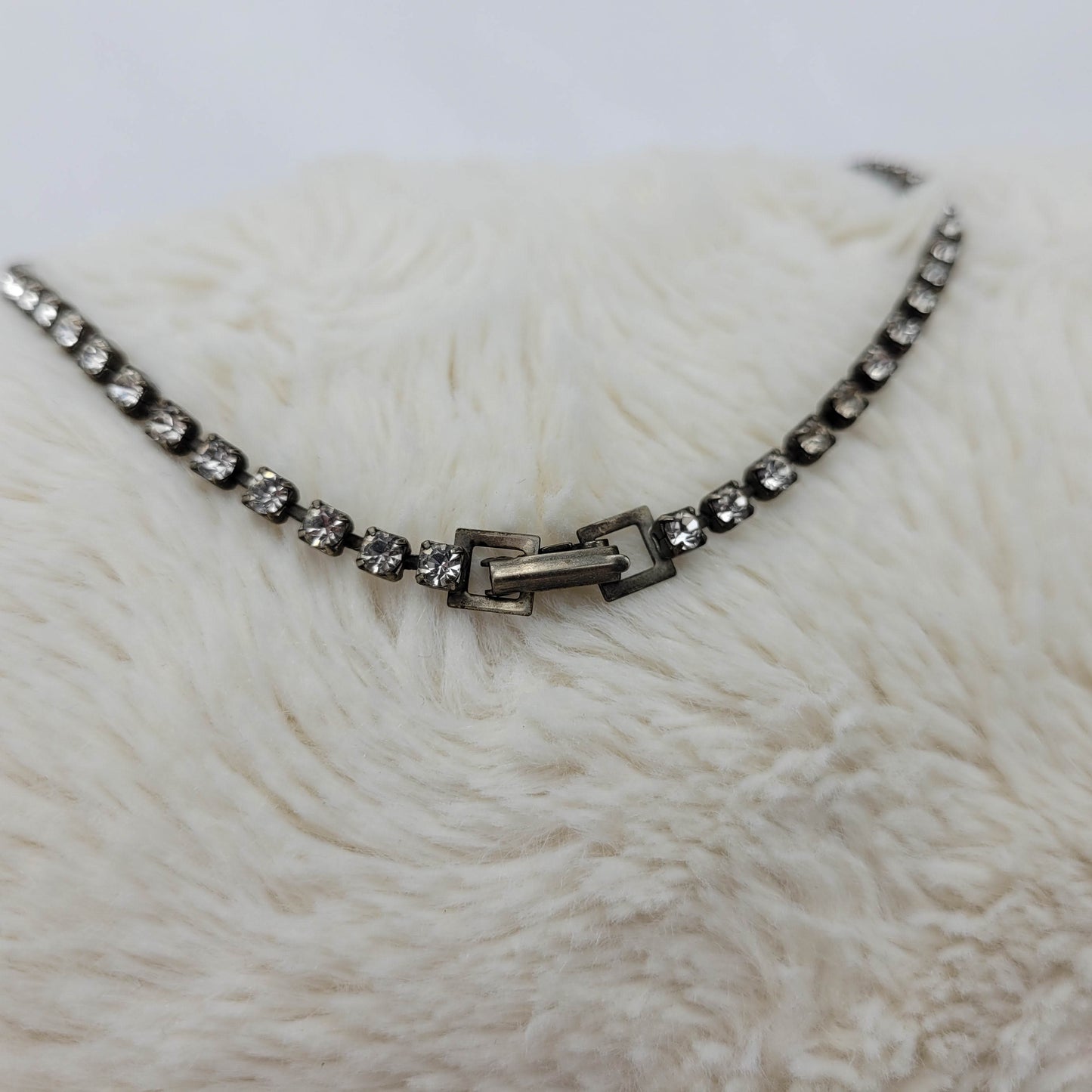 1950's Single to Triple Row Clear Rhinestone on a Dark Metal Necklace