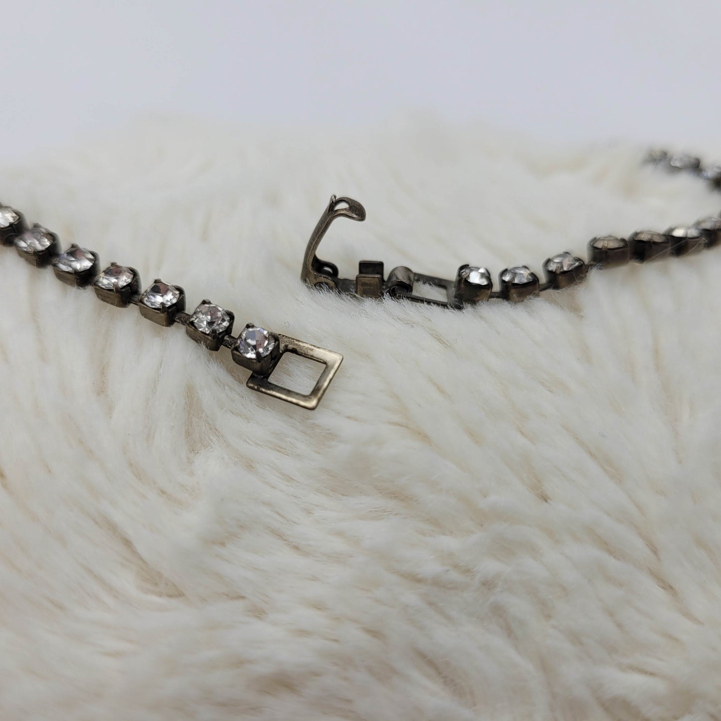 1950's Single to Triple Row Clear Rhinestone on a Dark Metal Necklace