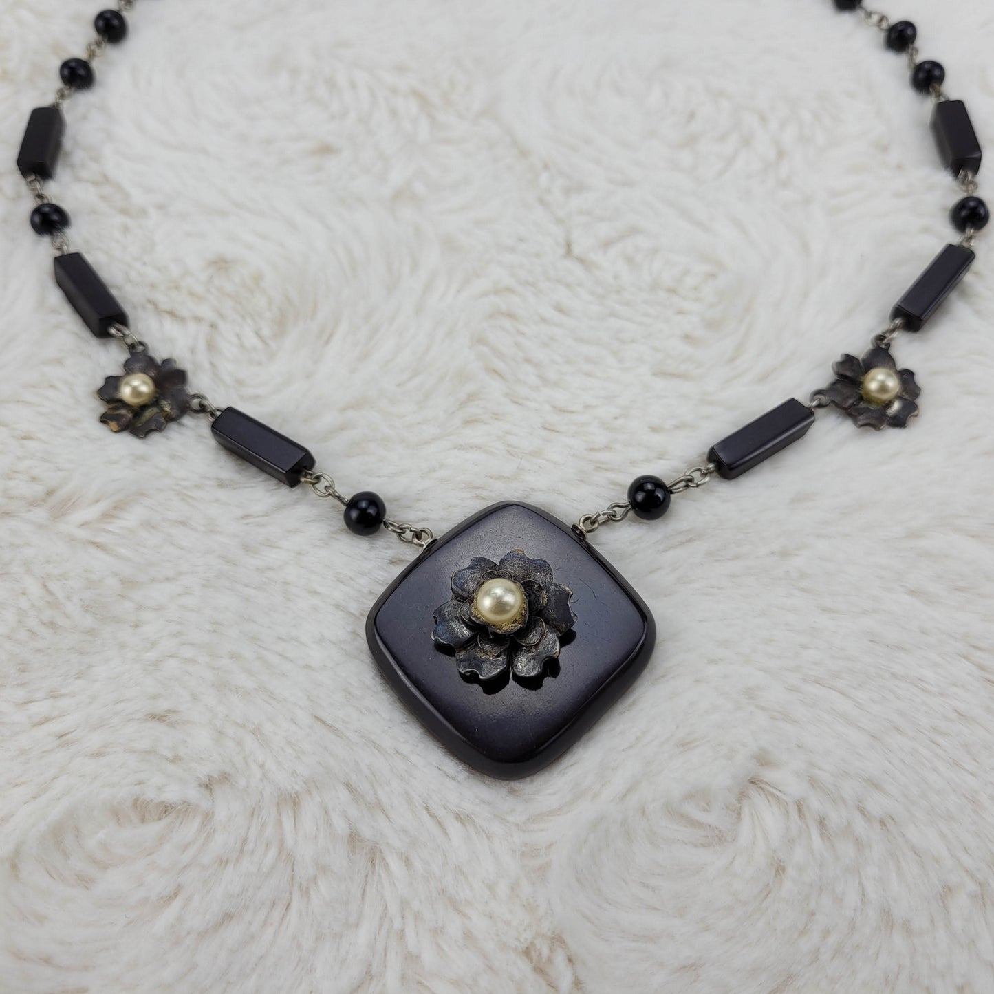 1960's Black Metal Flower Necklace with a Pearl Flower Square Pendant