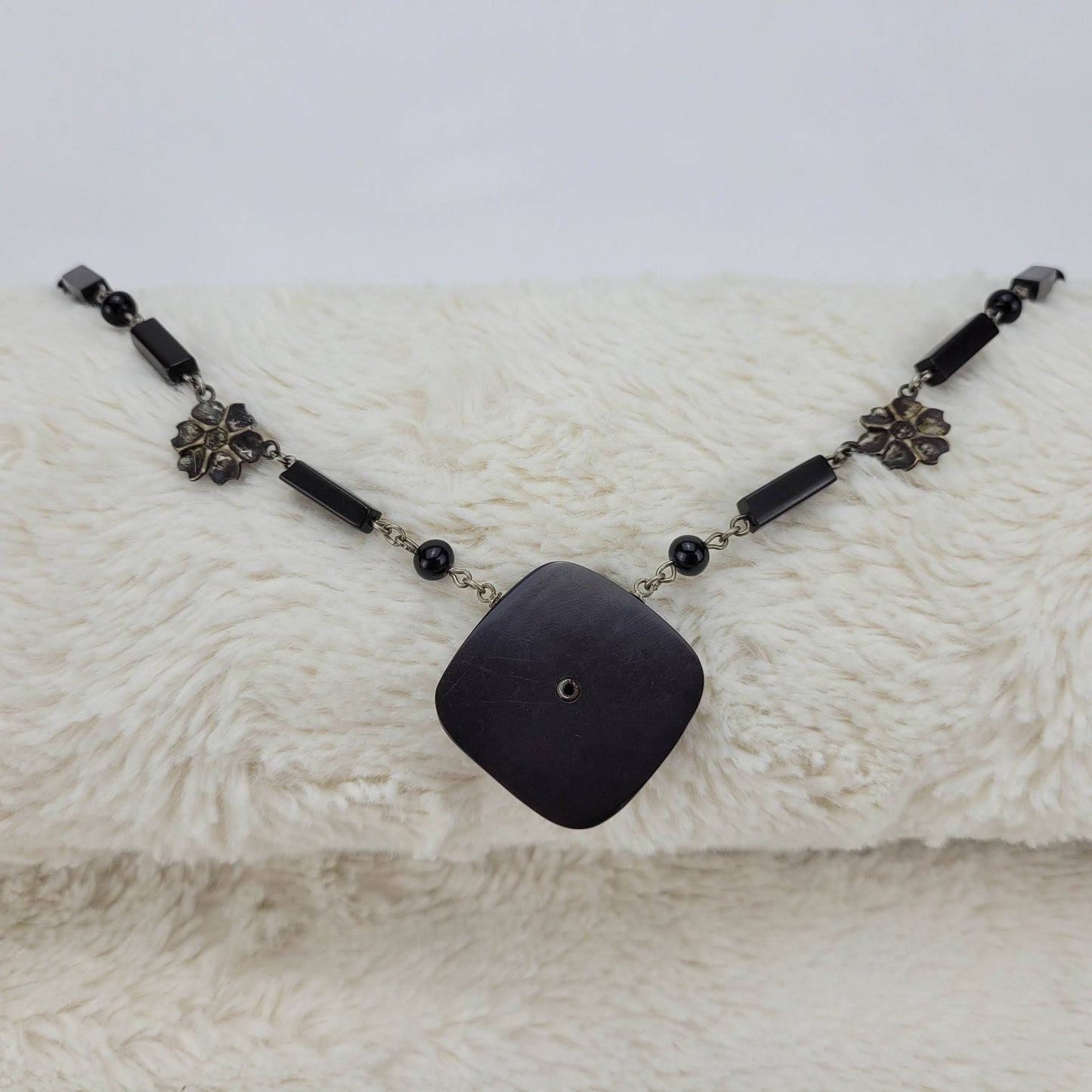 1960's Black Metal Flower Necklace with a Pearl Flower Square Pendant