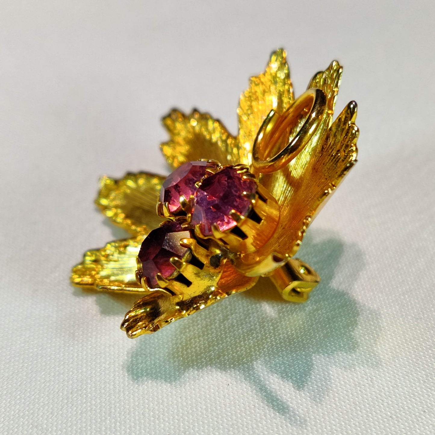 1970's Gold Metal and Purple Rhinestone Flower Pin