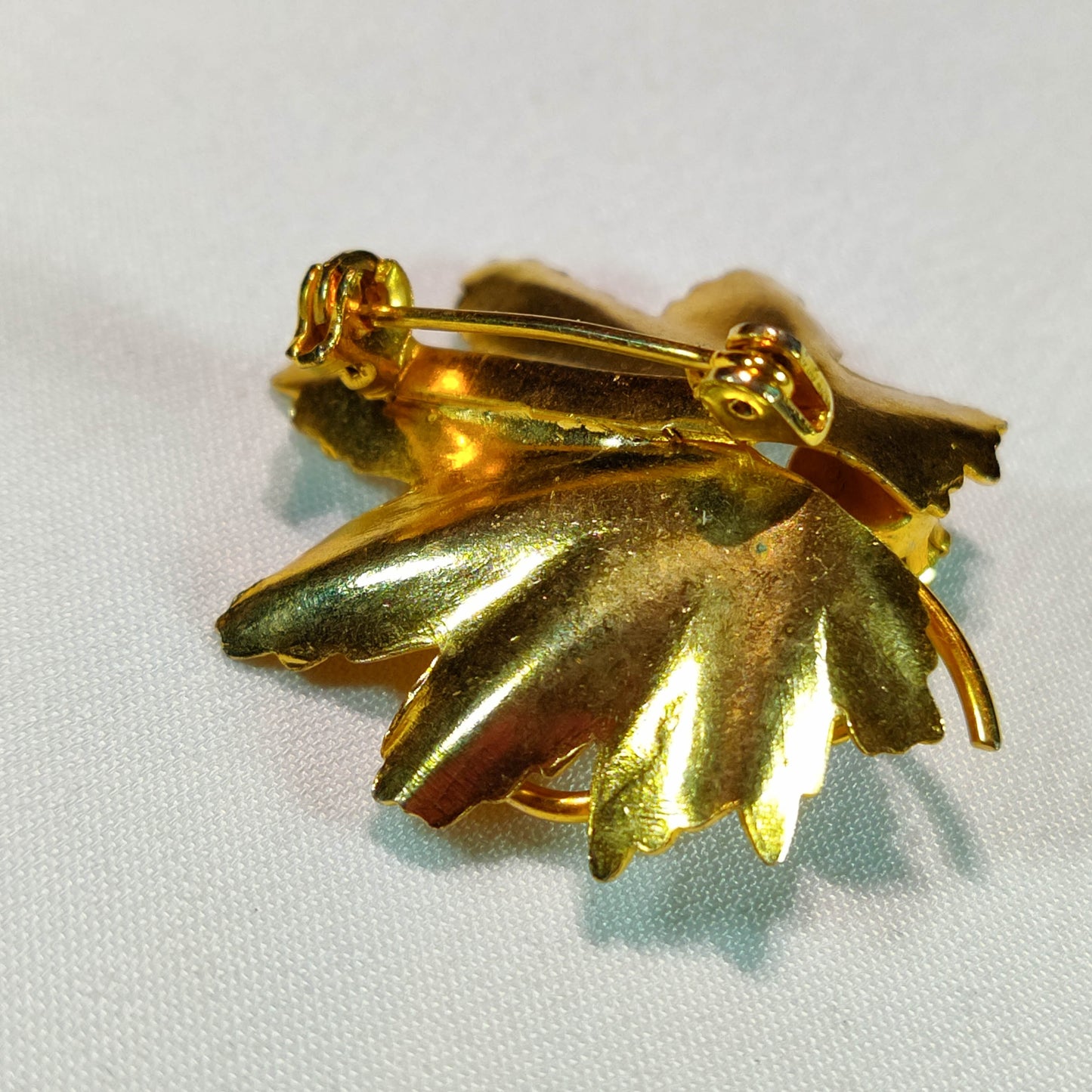 1970's Gold Metal and Purple Rhinestone Flower Pin