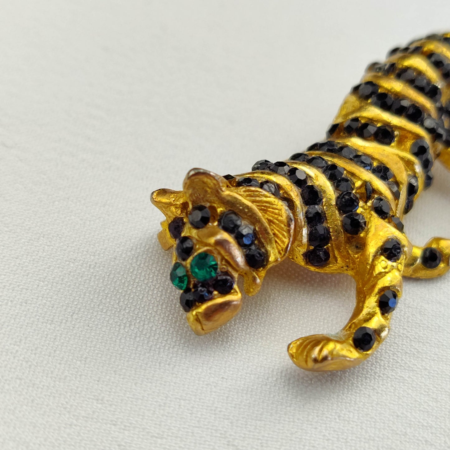 1950's Gold Tone Tiger Pin with Green and Black Rhinestones