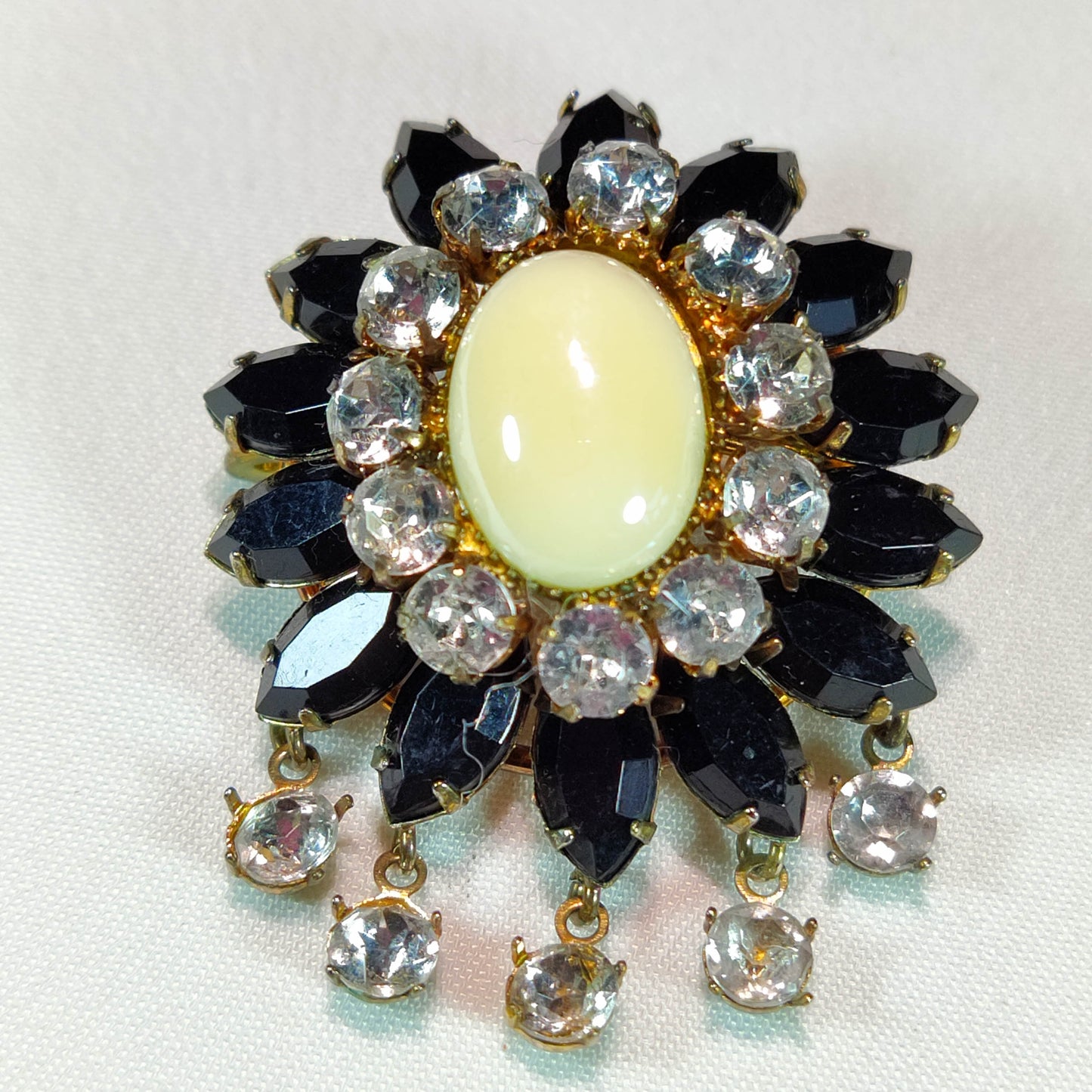 1930's Gold and Black Rhinestone Flower Dangle Pin with a Milkstone Center