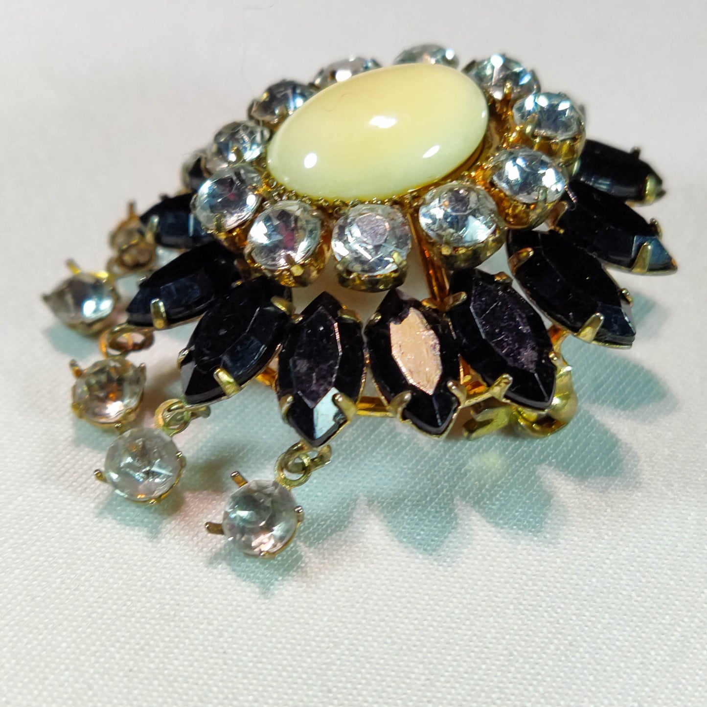 1930's Gold and Black Rhinestone Flower Dangle Pin with a Milkstone Center