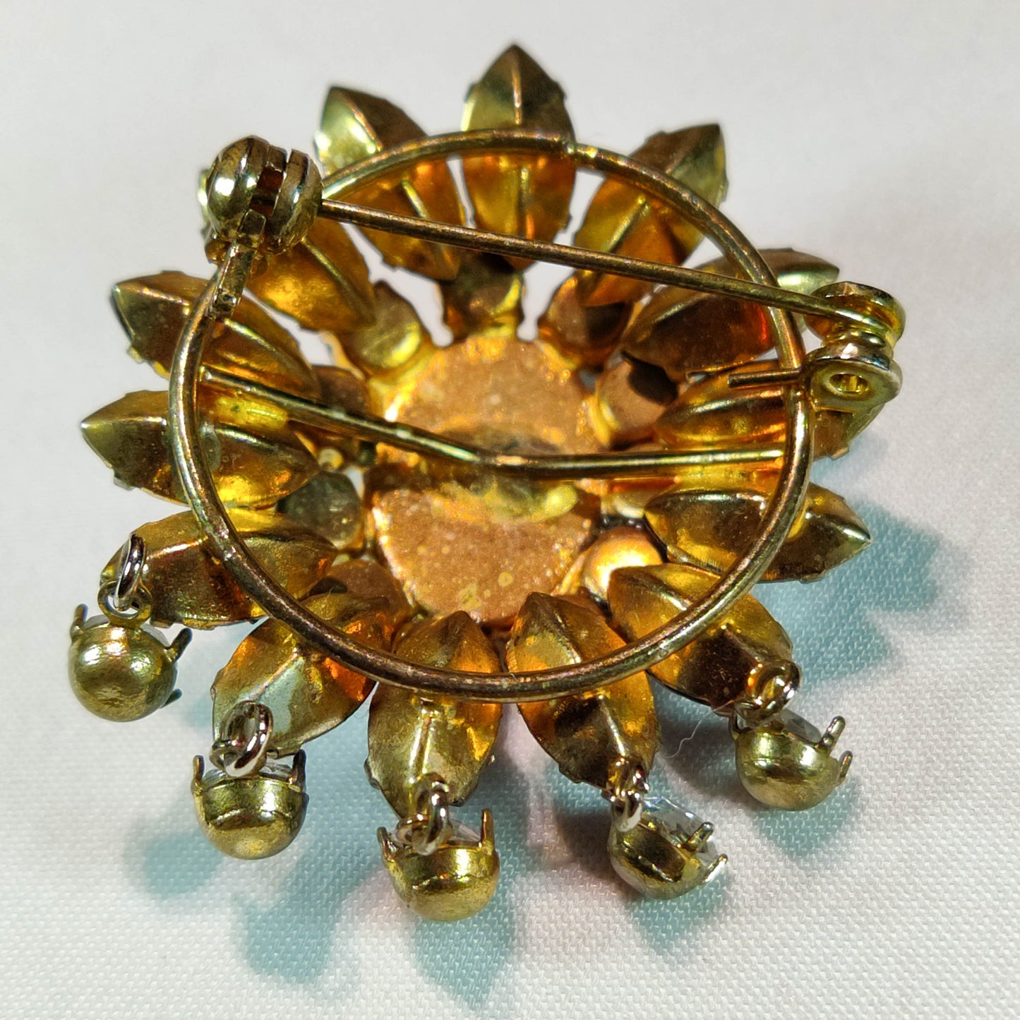 1930's Gold and Black Rhinestone Flower Dangle Pin with a Milkstone Center